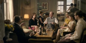 Conversing in Arendt's apartment.